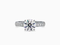 Regal Radiance Round Shape Brilliant Cut Diamond Side Multi Stone Channel Set Solitaire Ring